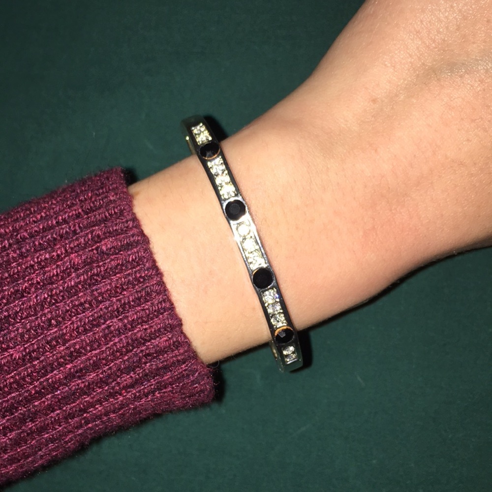 Silver bracelet with black and clear accents